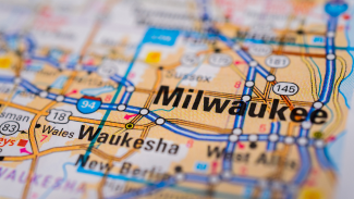 A map that closes in to show Milwaukee county