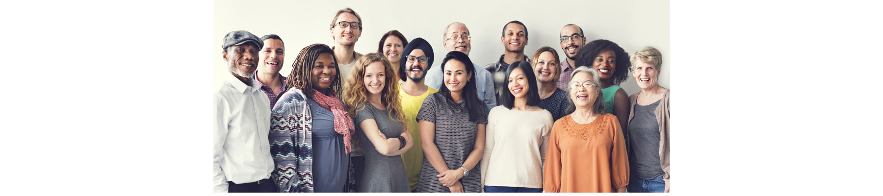 group of people standing and looking at camera