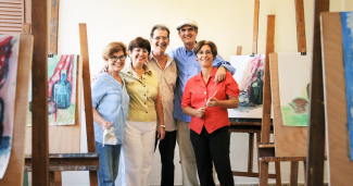 group of seniors at a painting class