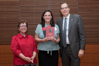 Dr. Carey Gleason receives the Vilas Award