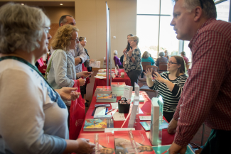 Photo of people talking at a resource fair