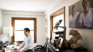 Dr. Nathaniel Chin working in his office
