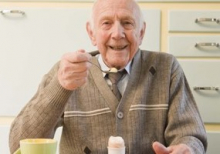 elderly man eating