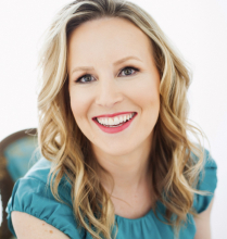 image of Dr. Michelle Braun smiling with a teal shirt