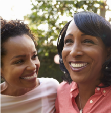 Two women smiling