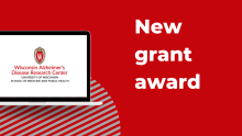 Graphic with red background and words New Grant Award in white