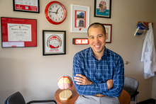 Dr. Nathaniel Chin seated in his office