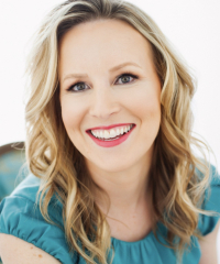 image of Dr. Michelle Braun smiling with a teal shirt